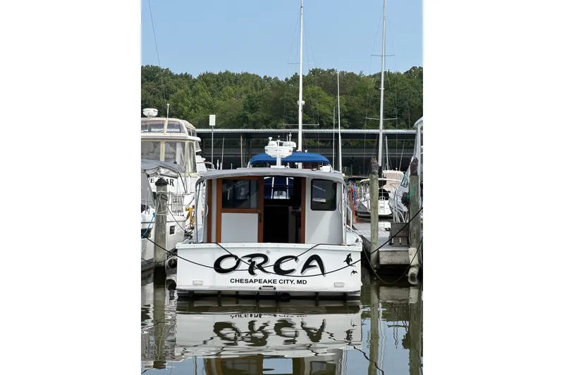 Slide: The Image of Boat named "Orca" docked in Chesapeake City, MD, Willis Beal 31, 2001 model. - 8