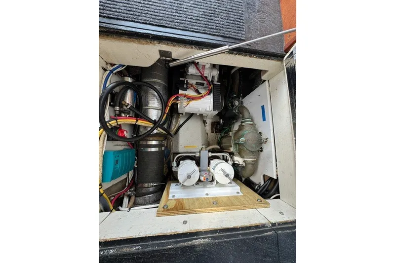 Slide: The Image of Engine compartment of a 2001 Willis Beal 31 boat, showing wiring and components. - 22