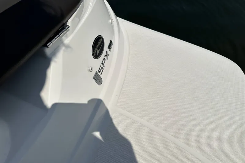 Slide: The Image of 2020 Sea Ray SPX 190 Outboard boat deck with logo detail. - 12