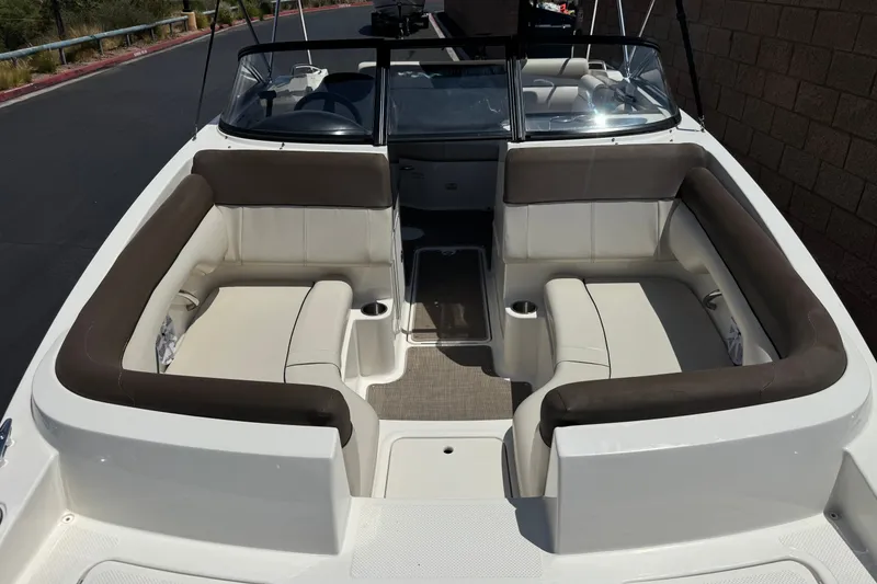 Slide: The Image of 2019 Bayliner 195 Deck Boat interior with spacious seating and modern design. - 12