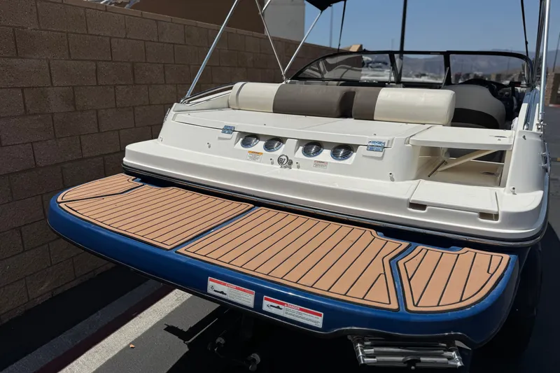 Slide: The Image of 2019 Bayliner 195 Deck Boat with spacious rear deck and comfortable seating. - 6
