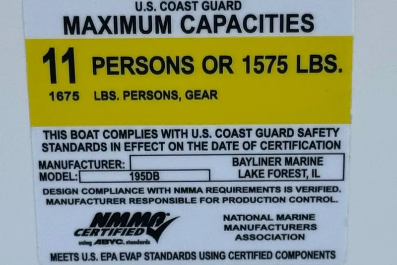 Slide: The Image of Bayliner 195 Deck Boat 2019 capacity label, 11 persons or 1575 lbs, NMMA certified. - 34
