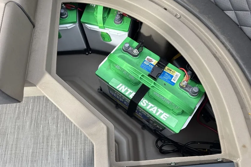 Slide: The Image of Battery compartment of a 2022 Bennington 25 LSAPG boat with Interstate batteries. - 21