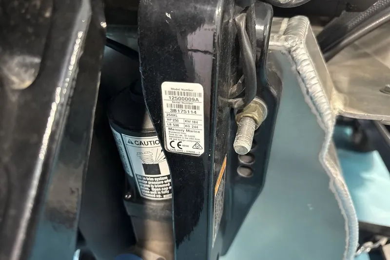 Slide: The Image of Close-up of a 2022 Bennington 25 LSAPG boat component with model and serial numbers. - 25