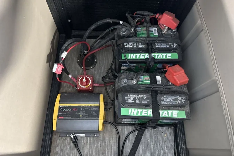 Slide: The Image of Battery setup in a 2022 Bennington 25 LSAPG with Interstate batteries and ProSport charger. - 22