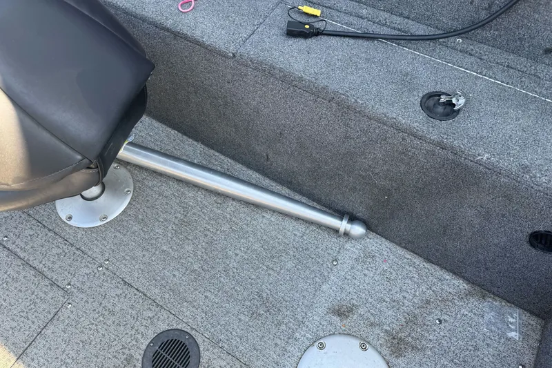 Slide: The Image of Interior of 2021 Tracker Pro Guide V-175 Combo boat showing seating and deck details. - 18