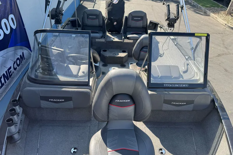 Slide: The Image of 2021 Tracker Pro Guide V-175 Combo boat interior with seating and windshield. - 24