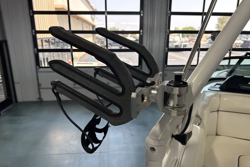 Slide: The Image of 2016 Moomba Mojo boat wakeboard rack in a garage setting. - 22