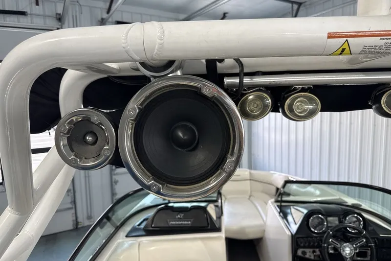 Slide: The Image of 2016 Moomba Mojo boat interior with speaker and light setup. - 21