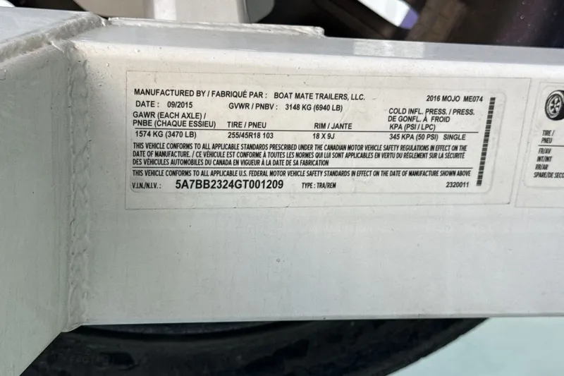 Slide: The Image of Label on 2016 Moomba Mojo trailer detailing specifications and compliance information. - 26