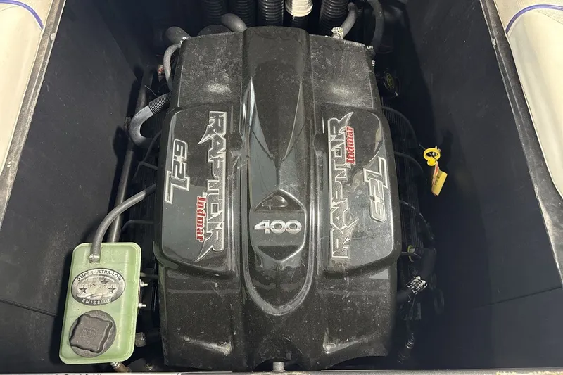 Slide: The Image of 2016 Moomba Mojo engine, Raptor Indmar 6.2L, 400 horsepower, in a boat compartment. - 20