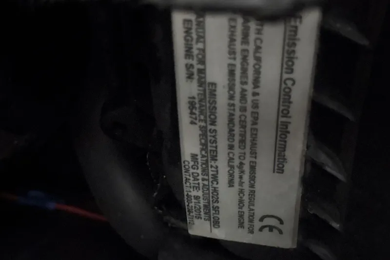 Slide: The Image of Emission control label on a 2016 Moomba Mojo engine. - 24