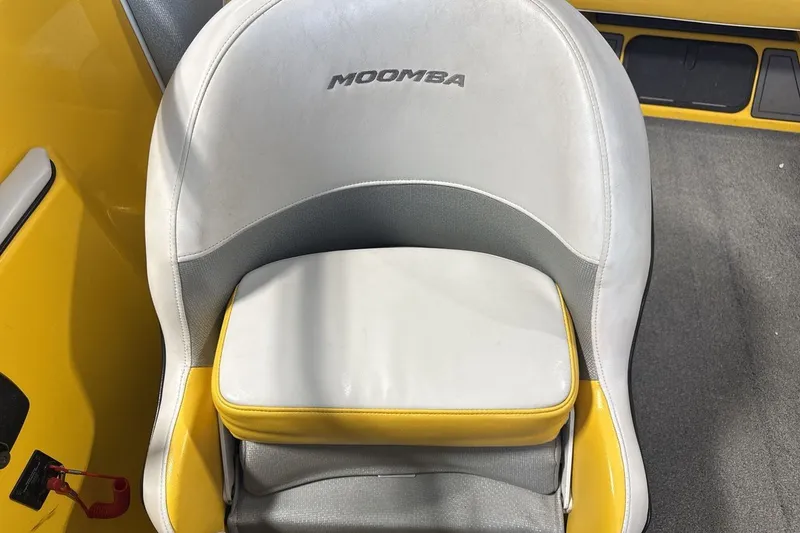 Slide: The Image of 2016 Moomba Mondo boat seat with yellow and gray accents. - 13