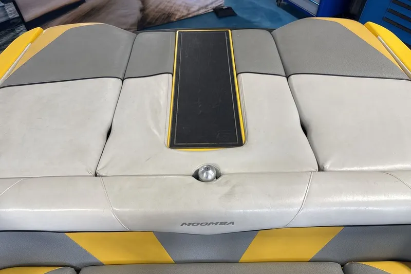 Slide: The Image of 2016 Moomba Mondo boat interior with gray and yellow upholstery. - 19
