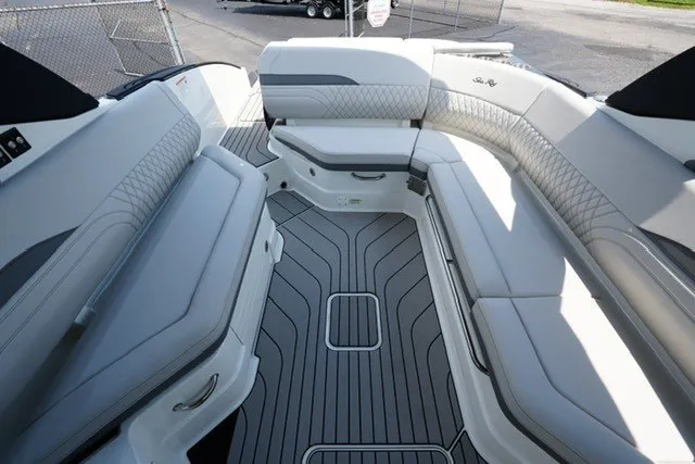 Slide: The Image of Luxurious interior of 2027 Sea Ray SLX 280 boat with elegant seating and modern design. - 17