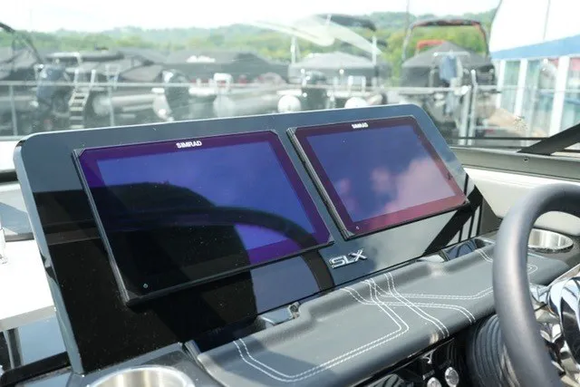 Slide: The Image of Dashboard of 2027 Sea Ray SLX 280 boat with dual Simrad displays. - 15