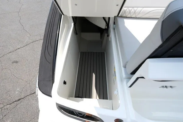 Slide: The Image of Storage compartment on a 2027 Sea Ray SLX 280 boat, featuring sleek design and ample space. - 22