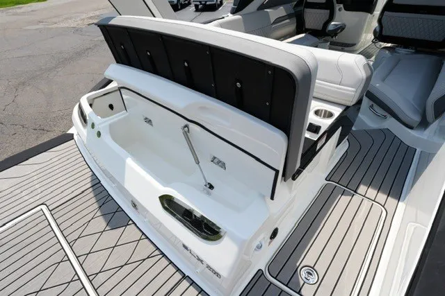 Slide: The Image of 2027 Sea Ray SLX 280 boat interior with seating and storage area. - 21
