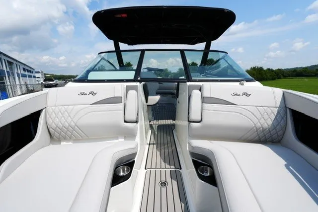 Slide: The Image of 2027 Sea Ray SLX 280 boat interior with luxurious seating and sleek design. - 11