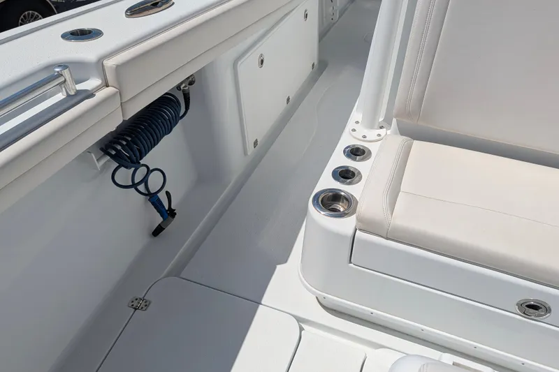 Slide: The Image of Interior of 2022 Yellowfin 36 Offshore boat with seating and cup holders. - 31