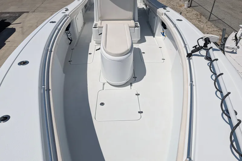 Slide: The Image of 2022 Yellowfin 36 Offshore boat deck, featuring sleek design and spacious seating. - 46