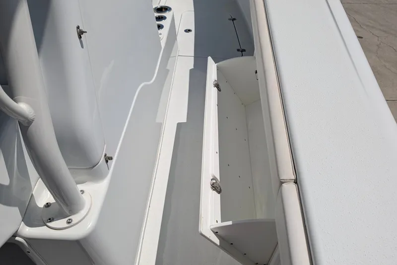 Slide: The Image of 2022 Yellowfin 36 Offshore boat interior storage compartment detail. - 26