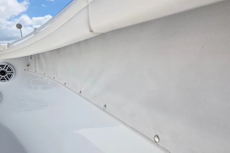 Slide: The Image of 2022 Yellowfin 36 Offshore boat interior with speaker and white paneling. - 39