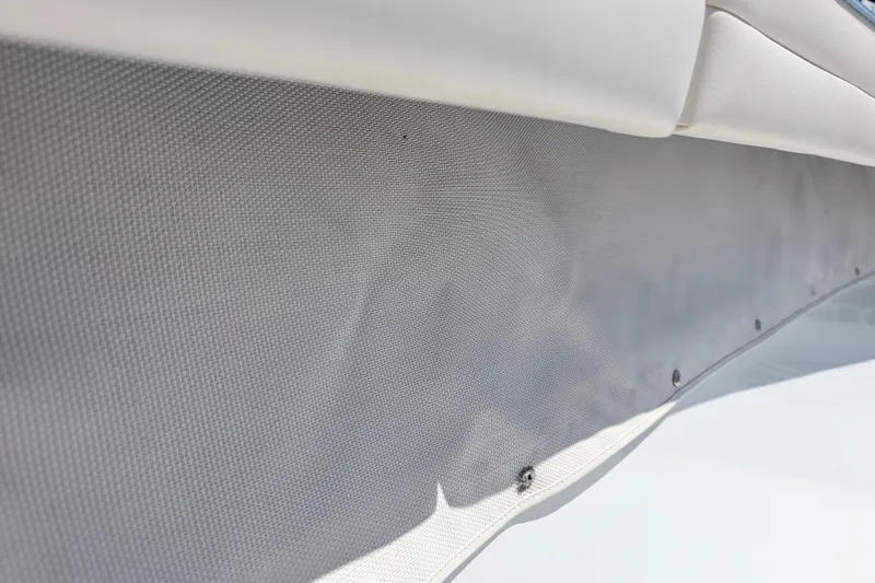 Slide: The Image of Interior detail of 2022 Yellowfin 36 Offshore boat, featuring textured upholstery and sleek design. - 37