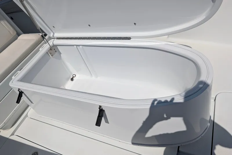 Slide: The Image of Open storage compartment on 2022 Yellowfin 36 Offshore boat, showcasing interior space. - 35