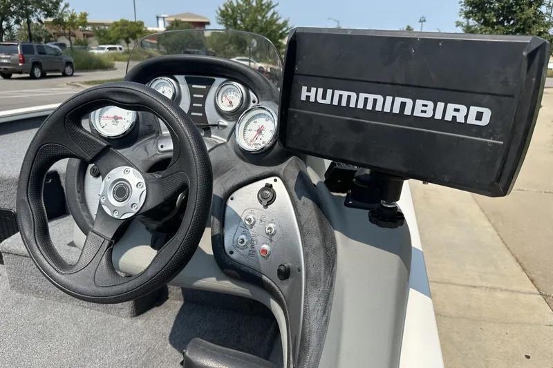 Slide: The Image of Steering console of 2017 Tracker Pro Team 195 Tournament Edition with Humminbird fish finder. - 16