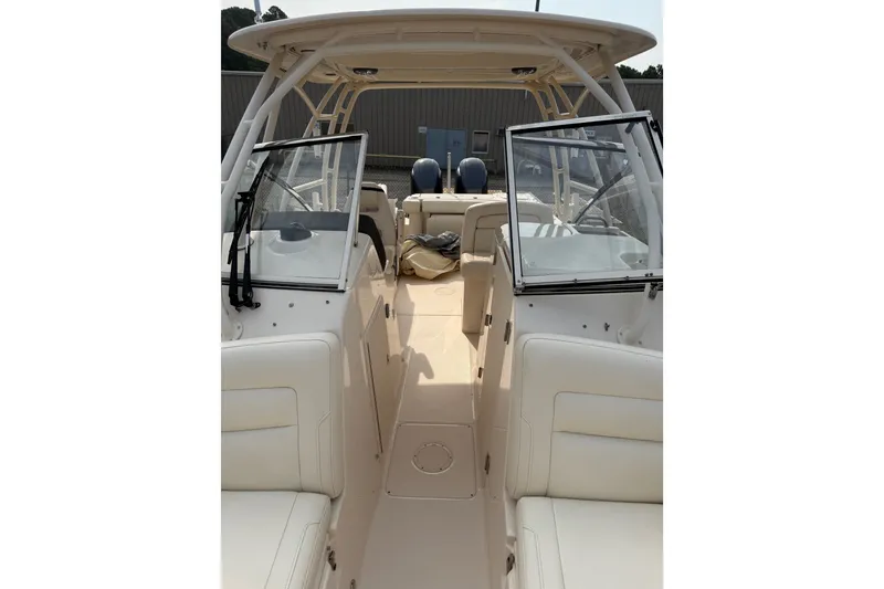 Slide: The Image of 2020 Grady-White Freedom 275 boat interior with dual consoles and seating. - 11