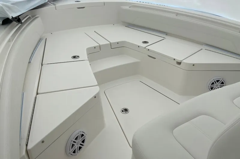 Slide: The Image of 2027 Regulator 24XO boat interior with spacious seating and modern design. - 6