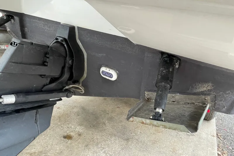 Slide: The Image of Close-up of 2017 Crownline 285 SS boat's stern drive and trim tab. - 33
