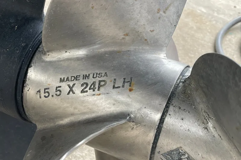 Slide: The Image of Close-up of a Crownline 285 SS 2017 boat propeller, marked "Made in USA 15.5 X 24P LH". - 30