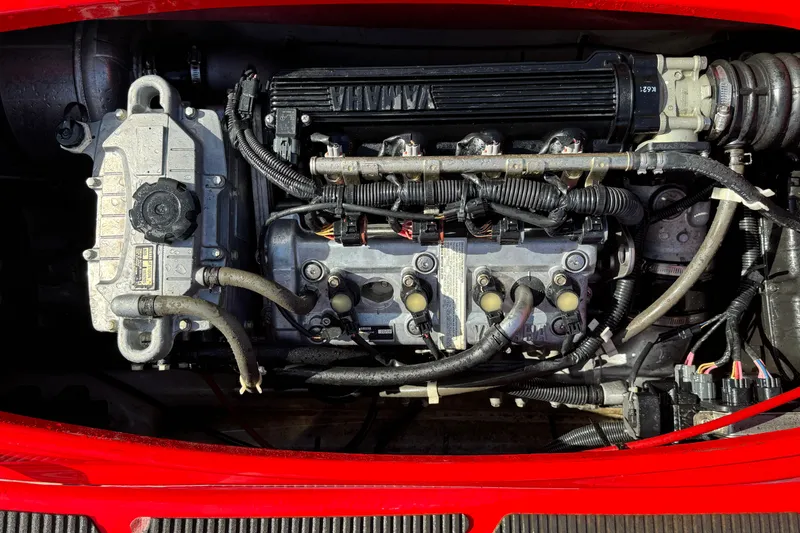 Slide: The Image of Engine of a 2006 Yamaha WaveRunner VX110 Deluxe, showcasing intricate mechanical components. - 8
