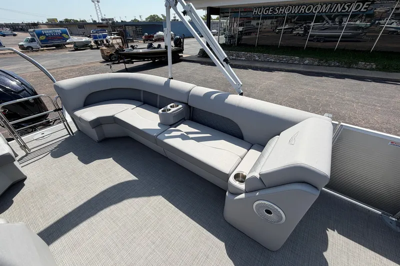 Slide: The Image of 2025 Bennington 22 L Quad Bench pontoon boat with spacious seating and modern design. - 23