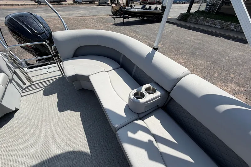 Slide: The Image of 2025 Bennington 22 L Quad Bench boat with spacious seating and cup holders. - 28