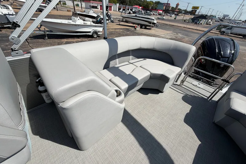 Slide: The Image of 2025 Bennington 22 L Quad Bench pontoon boat with spacious seating and modern design. - 36