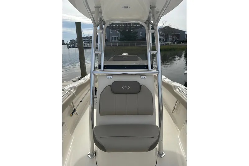 Slide: The Image of 2024 Key West 239 FS boat interior with seating and stainless steel frame. - 4