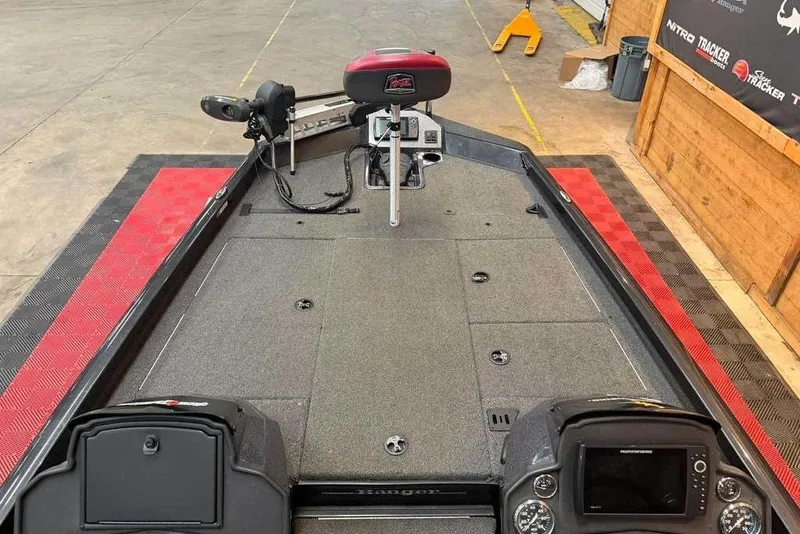 Slide: The Image of 2020 Ranger RT188P fishing boat interior with advanced controls and spacious deck. - 5