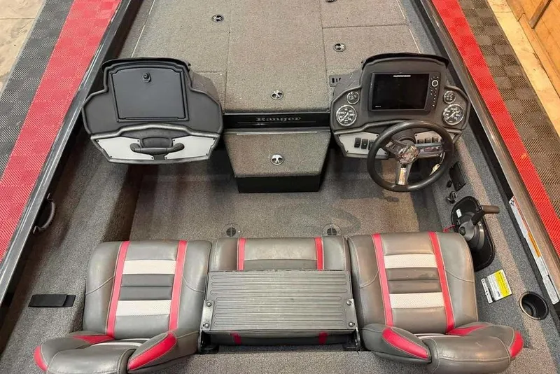 Slide: The Image of 2020 Ranger RT188P boat interior with dual seats, steering console, and storage compartments. - 7