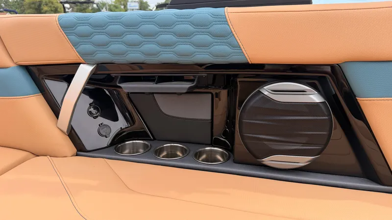 Slide: The Image of Interior view of a 2027 MasterCraft XT22 with stylish seating and speakers. - 43