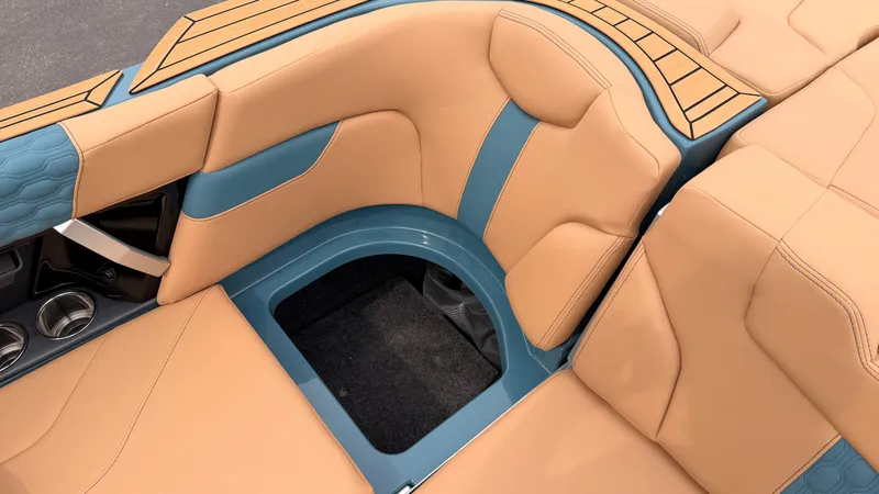 Slide: The Image of Interior of a 2027 MasterCraft XT22 with beige and blue upholstery. - 27