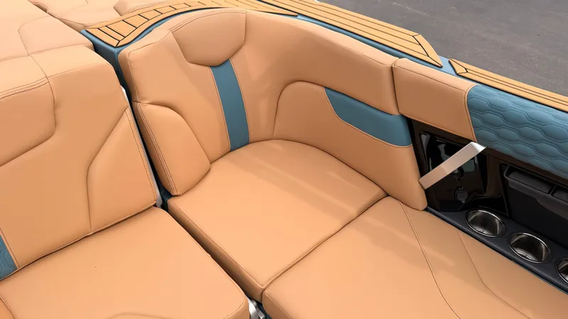 Slide: The Image of The image shows the luxurious seating of a MasterCraft XT22 boat with beige and blue upholstery. - 38
