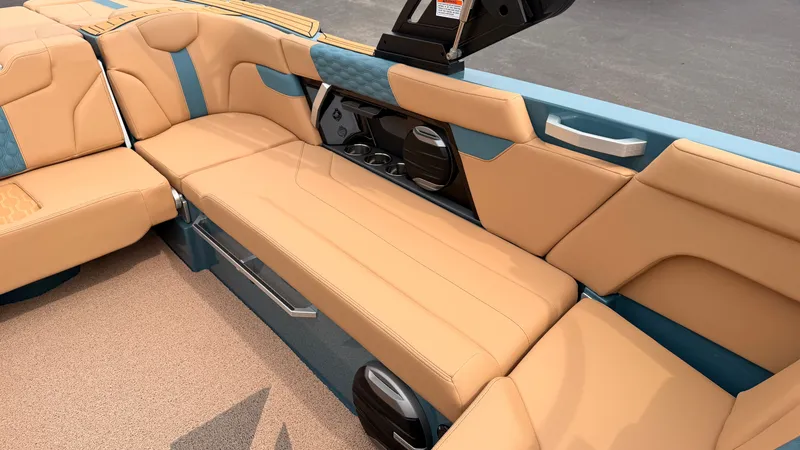 Slide: The Image of The image shows the luxurious interior of a 2027 MasterCraft XT22 with beige and blue seating. - 41