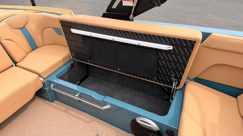 Slide: The Image of The image shows the seating area of a 2027 MasterCraft XT22 with storage underneath. - 42