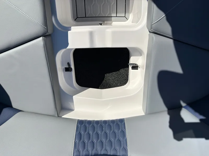 Slide: The Image of Close-up of a boat storage compartment with cushioned seating and an open hatch. - 16