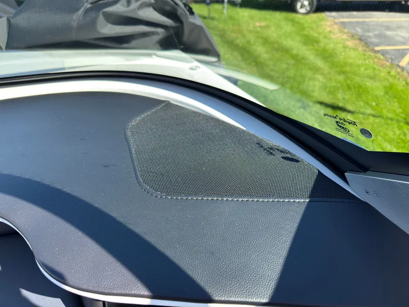 Slide: The Image of Close-up of a 2027 MasterCraft XT22 dashboard with speaker grille. - 29