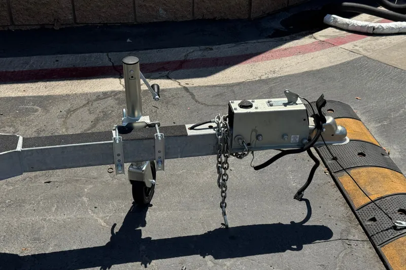 Slide: The Image of Trailer hitch of a 2024 Lexington Emerg 17 Palm Breeze on asphalt. - 25