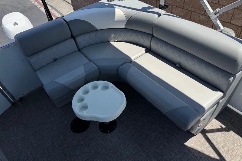 Slide: The Image of Luxurious seating area on 2024 Lexington Emerg 17 Palm Breeze pontoon boat. - 15